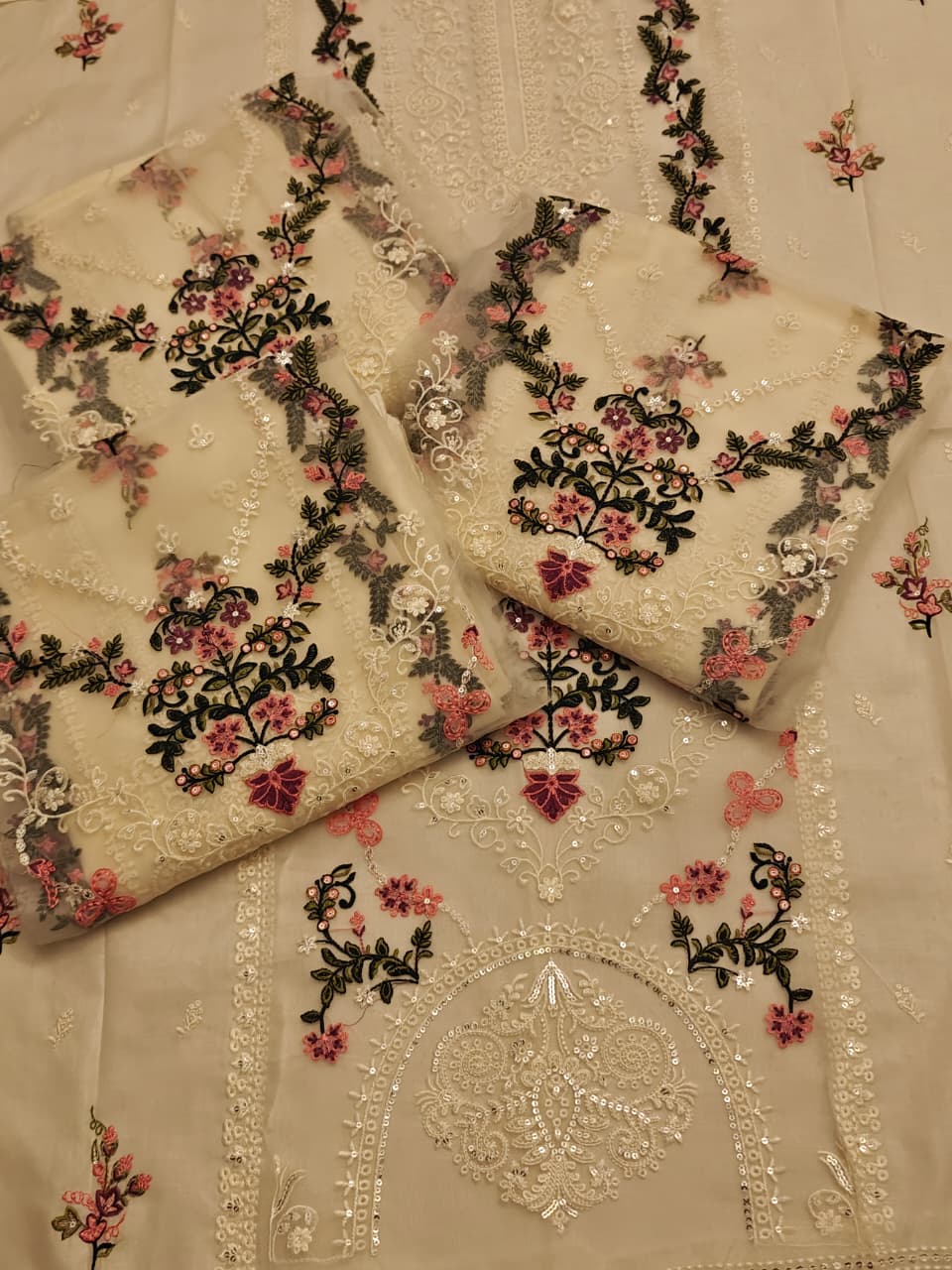 Brand: * Bareeze* Fabric: * Lawn * Status: Emb Code: 1684  Front Full Heavy EMB with center organza panel  Sleeves light weight EMB Back light weight EMB Trouser Plain